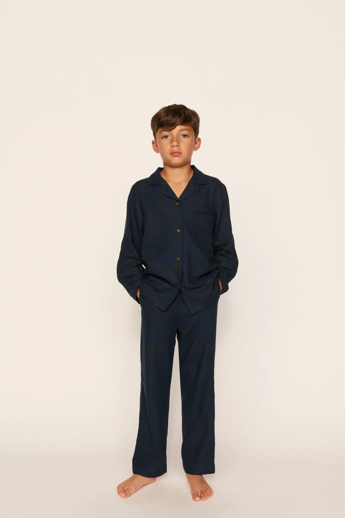 Model is wearing Kid's Flannel Long PJ Set in Heritage Check Navy/Navy
