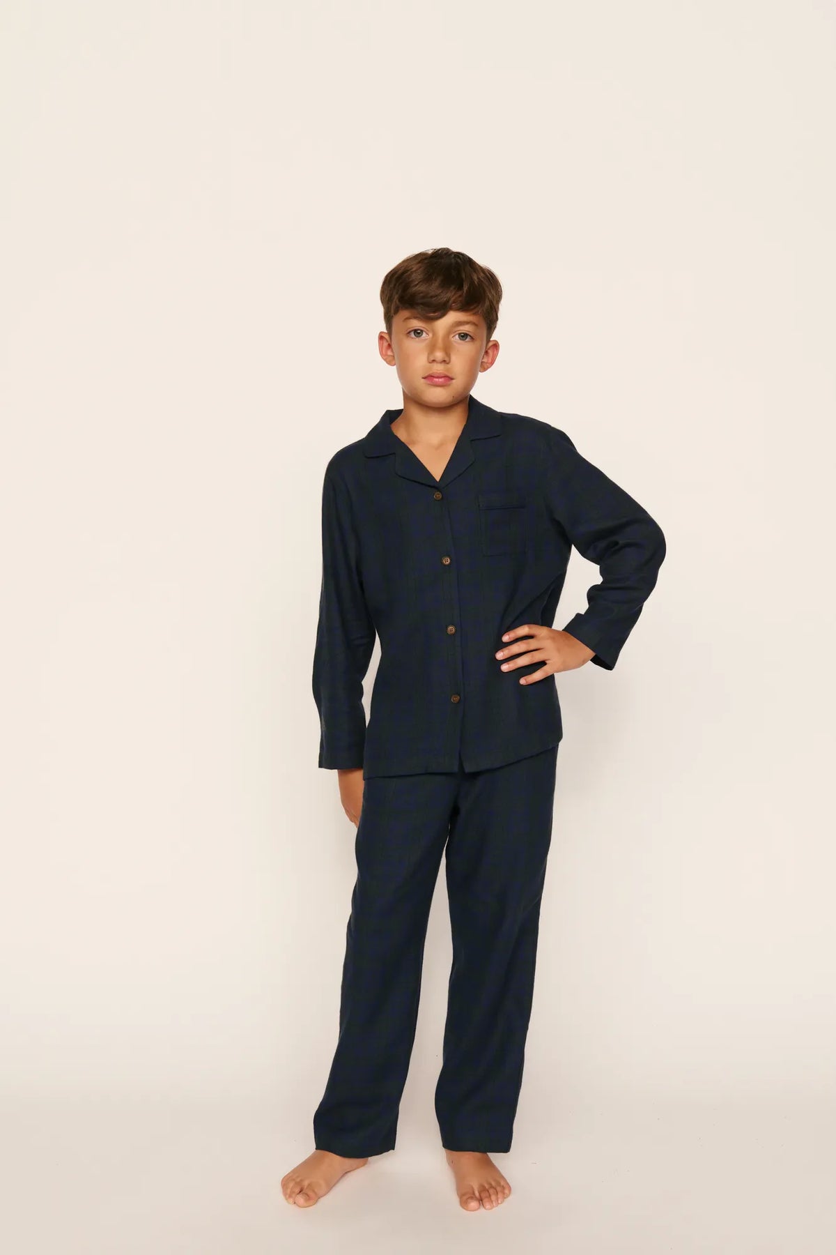 Model is wearing Kid's Flannel Long PJ Set in Heritage Check Navy/Navy