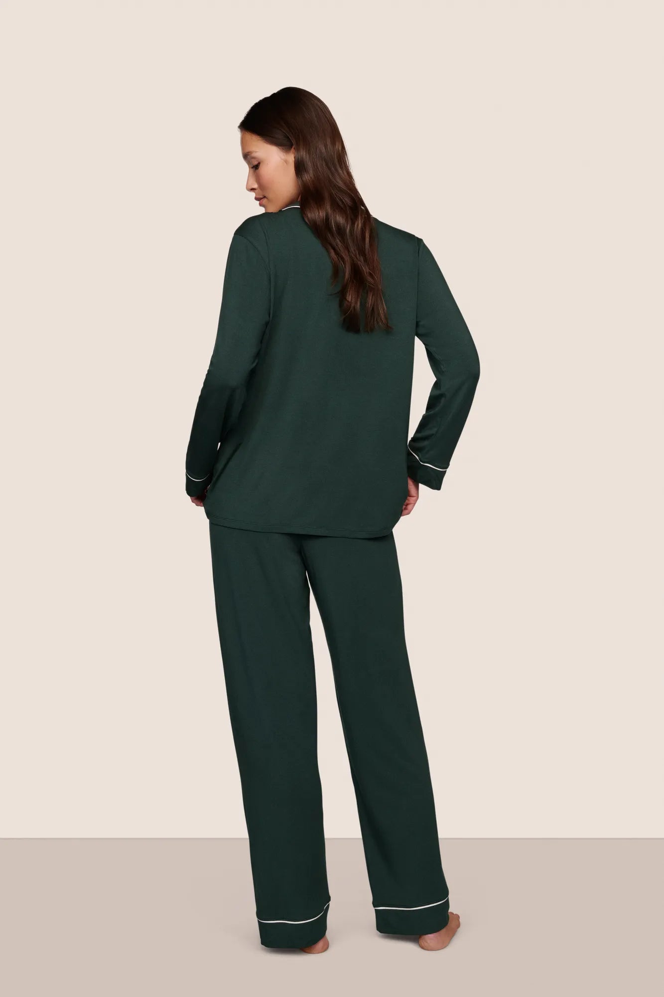 Model is wearing Gisele TENCEL™ Modal Long PJ Set  in Pine/Ivory