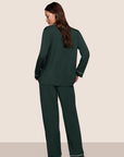 Model is wearing Gisele TENCEL™ Modal Long PJ Set  in Pine/Ivory