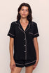 Model is wearing Gisele TENCEL™ Modal Relaxed Short PJ Set in Black/Sorbet Pink