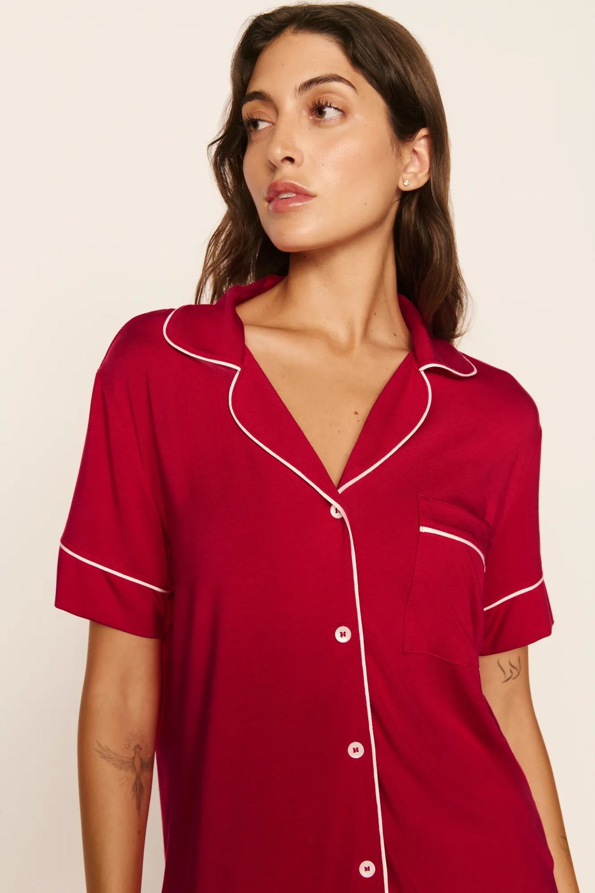 Model is wearing Gisele TENCEL™ Modal Relaxed Short PJ Set in Holly Red/Ivory