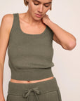 Model is wearing Recycled Sweater Cropped Tank  in Smokey Olive