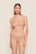 Model is wearing Anouk Bralette in Nude