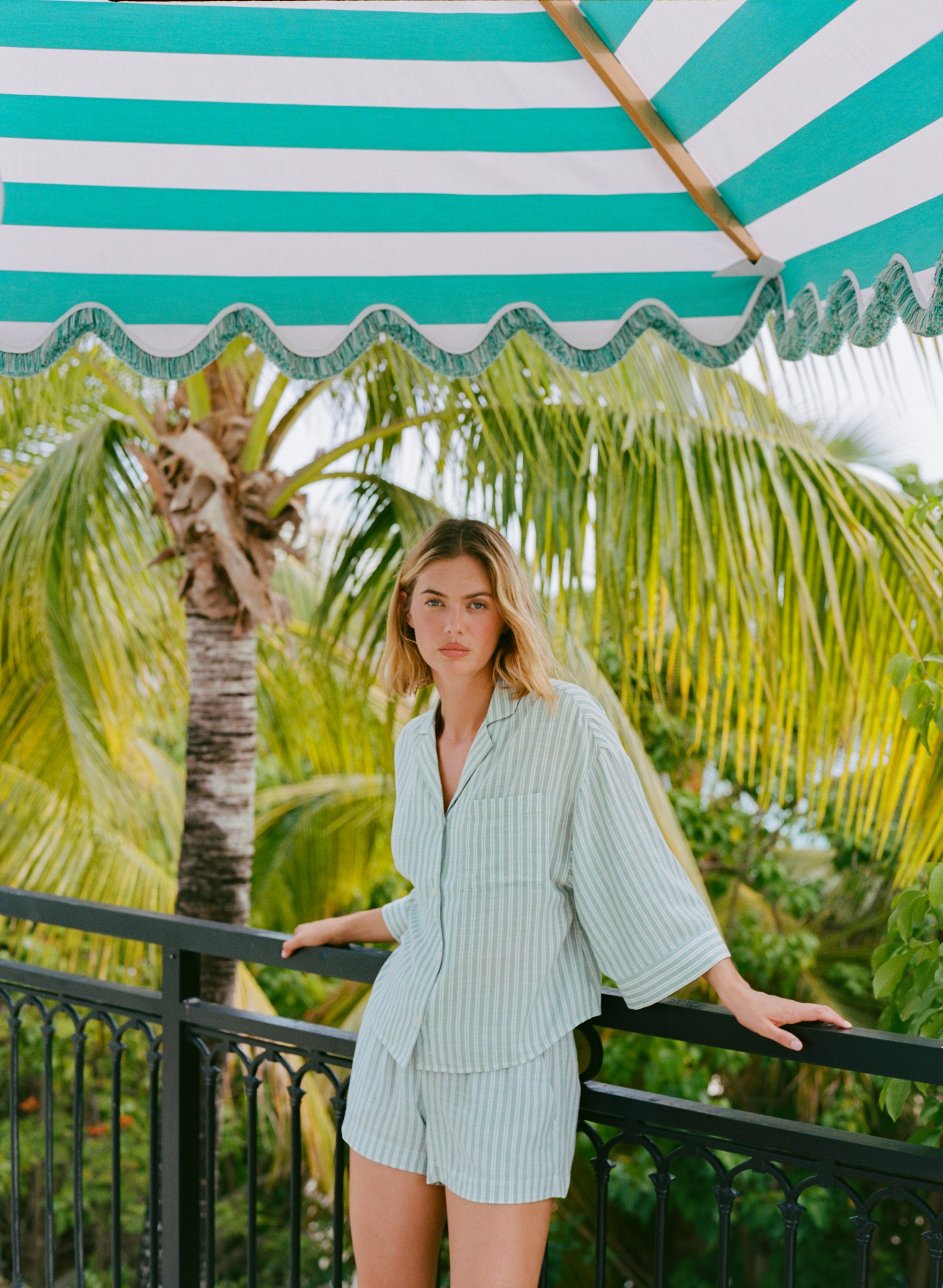 Model is wearing Nautico Relaxed Short PJ Set in Regatta Stripe Seagrass/White
