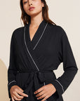 Model is wearing the Gisele TENCEL™ Modal Robe in Black/Sorbet Pink.