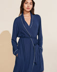 Model is wearing the Gisele TENCEL™ Modal Robe in navy/ivory.