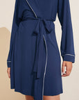 Model is wearing the Gisele TENCEL™ Modal Robe in navy/ivory.