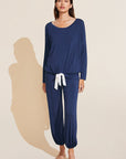 Model wears Gisele TENCEL™ Modal Slouchy PJ Set in Navy/Ivory.