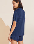 Model wears Gisele TENCEL™ Modal Rib Relaxed Short PJ Set in Navy.