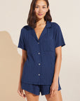 Model wears Gisele TENCEL™ Modal Rib Relaxed Short PJ Set in Navy.