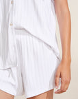 Model wears Gisele TENCEL™ Modal Rib Relaxed Short PJ Set in white.