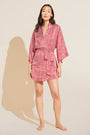 Model wears Inez Printed Washable Silk Short Robe in Leopard Spot Haute Red.