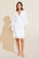 Model wears Mariana TENCEL™ Modal Robe in White.