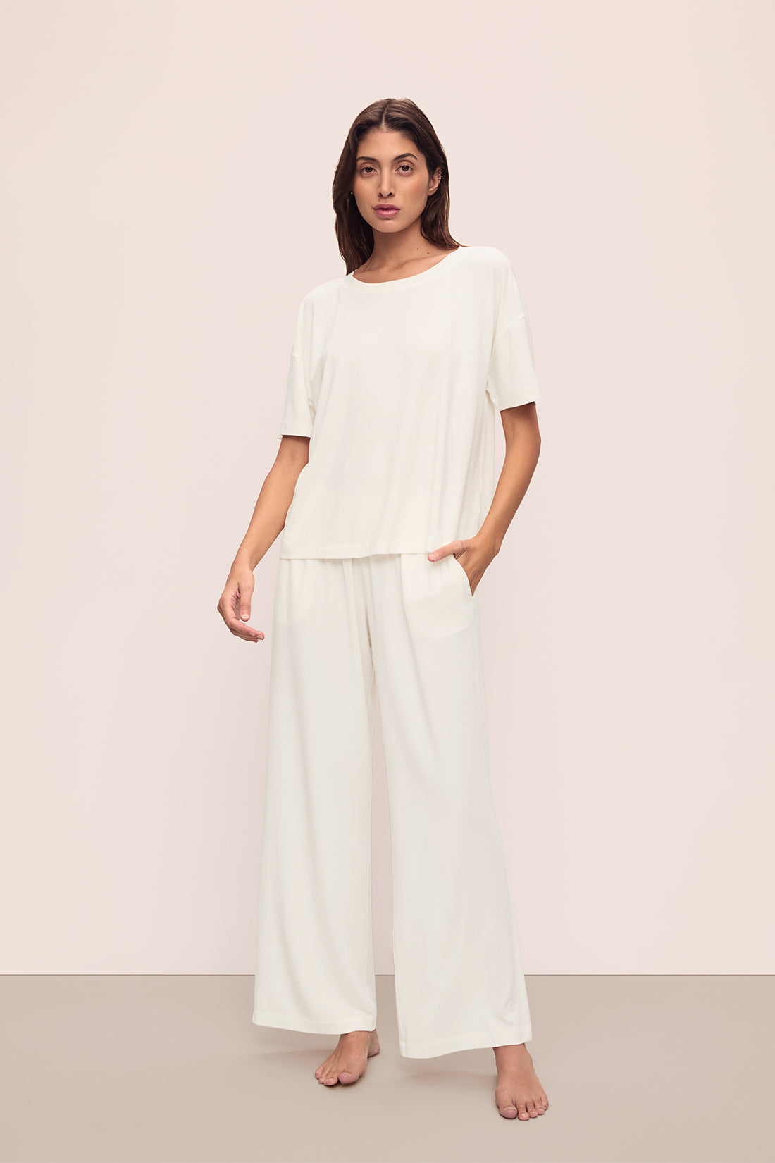 Model is wearing Gisele TENCEL™ Modal Everyday Straight Leg Pant in Ivory