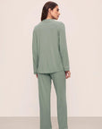 Model is wearing Gisele TENCEL™ Modal Long PJ Set in Eucalyptus/Ivory