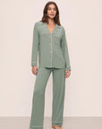 Model is wearing Gisele TENCEL™ Modal Long PJ Set in Eucalyptus/Ivory