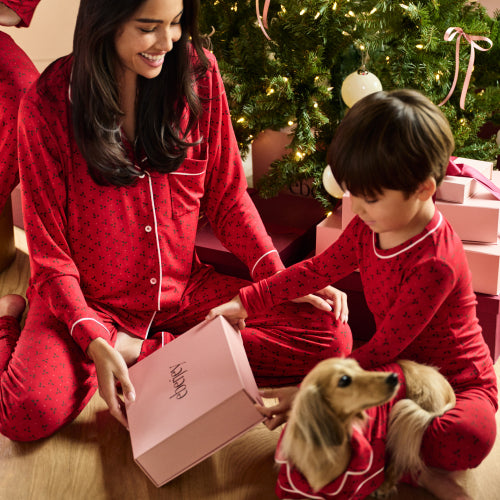 Image of matching family PJs in hollyberry holly red