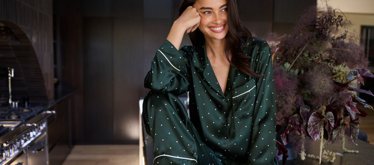 Model is wearing Inez Washable Silk Printed Long PJ Set in Dot Pine/Ivory