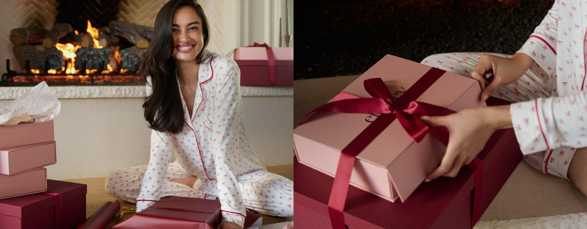 Model is wearing Gisele Printed TENCEL™ Modal Long PJ Set in Mini Bow Ivory/Holly Red