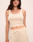 Model wears Recycled Sweater Cropped Tank in Oat.