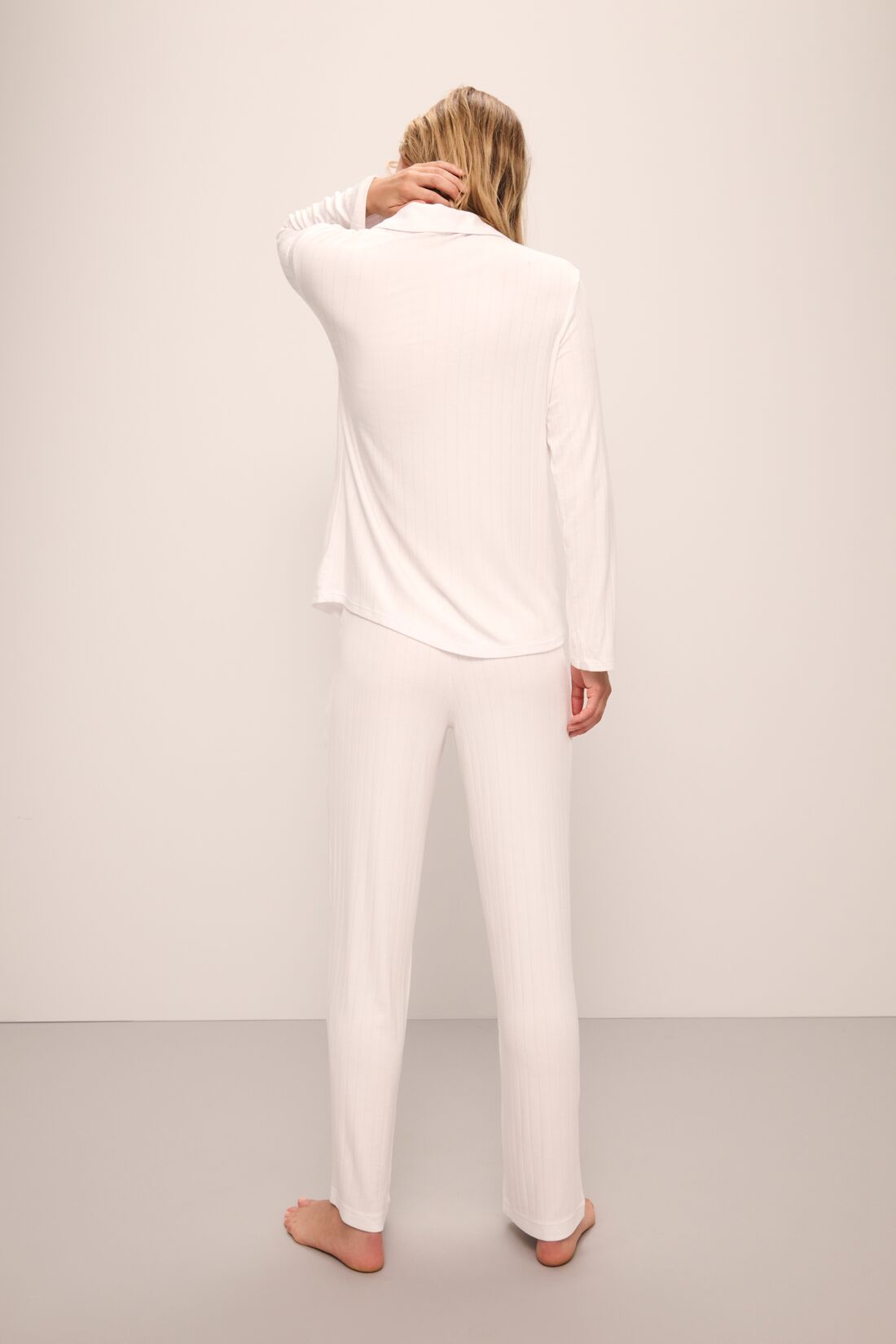 Model wears Gisele TENCEL™ Modal Rib Long PJ Set in white.