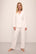 Model wears Gisele TENCEL™ Modal Rib Long PJ Set in white.