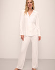 Model wears Gisele TENCEL™ Modal Rib Long PJ Set in white.