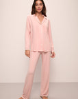 Model wears Frida TENCEL™ Modal Long PJ Set in silver pink/ivory.