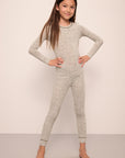 Model wears Kids Printed TENCEL™ Modal Unisex Long PJ Set in Ella Spark/Moss.