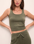 Model wears the Recycled Sweater Cropped Tank in moss.