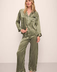 Model is wearing Inez Washable Silk Printed Long PJ Set in Classic Stripe Moss/Moss.