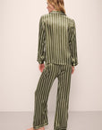 Model is wearing Inez Washable Silk Printed Long PJ Set in Classic Stripe Moss/Moss.