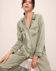 Model is wearing Inez Washable Silk Printed Long PJ Set in Geo Sphere Moss/Navy.