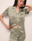 Model wears Inez Washable Silk Printed Short PJ Set in Geo Sphere Moss/Navy.