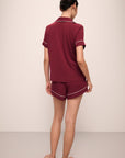 Model wears Gisele TENCEL™ Modal Relaxed Short PJ Set in Cabernet/Ivory.