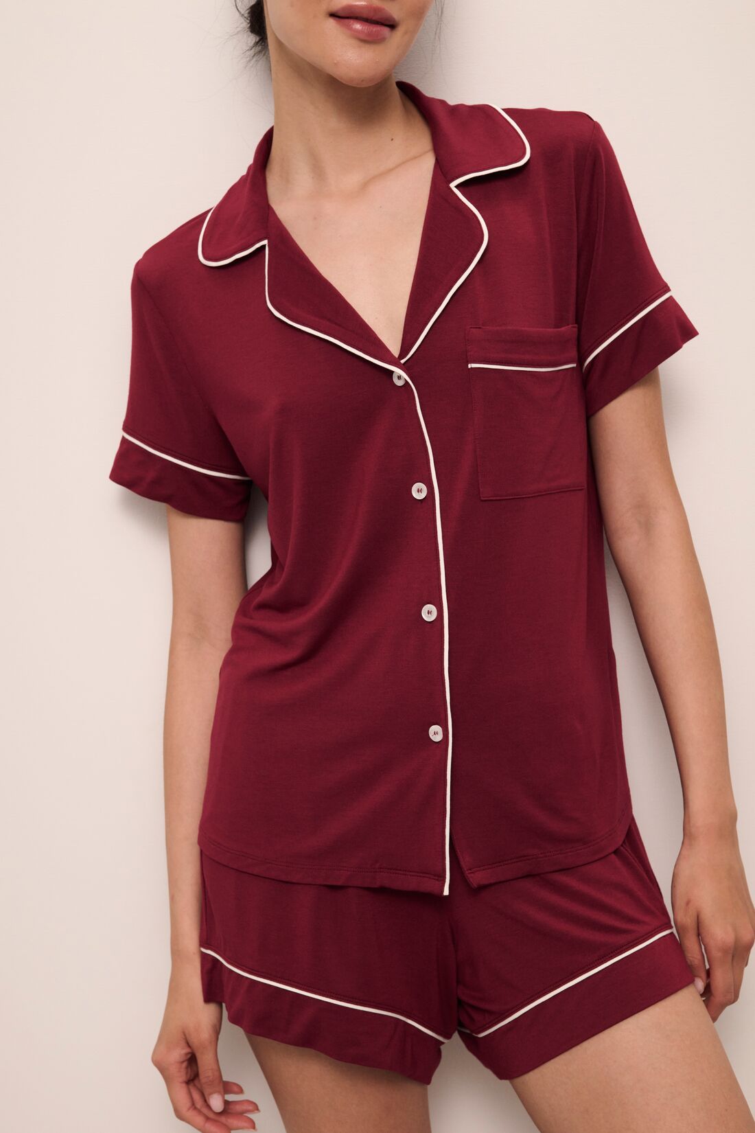 Model wears Gisele TENCEL™ Modal Relaxed Short PJ Set in Cabernet/Ivory.