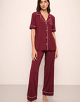 Model wears Gisele TENCEL™ Modal Short Sleeve & Pant PJ Set in Cabernet/Ivory.