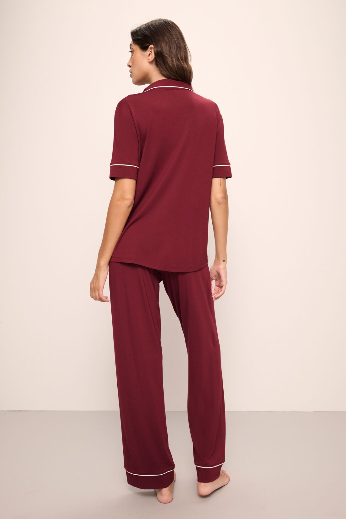 Model wears Gisele TENCEL™ Modal Short Sleeve & Pant PJ Set in Cabernet/Ivory.