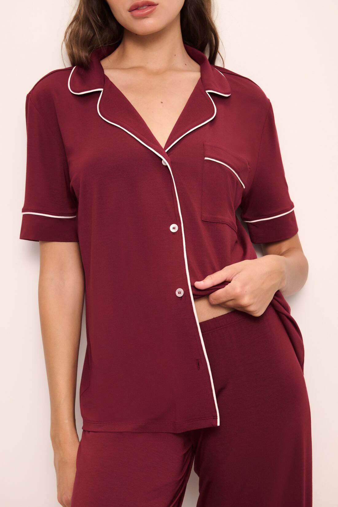 Model wears Gisele TENCEL™ Modal Short Sleeve & Pant PJ Set in Cabernet/Ivory.