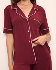 Model wears Gisele TENCEL™ Modal Short Sleeve & Pant PJ Set in Cabernet/Ivory.