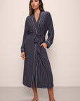 Model wears Gisele Printed TENCEL™ Modal Long Robe in Duo Stripe True Navy/Ivory.