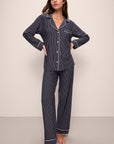 Model wears Gisele Printed TENCEL™ Modal Long PJ Set in Duo Stripe True Navy/Ivory.