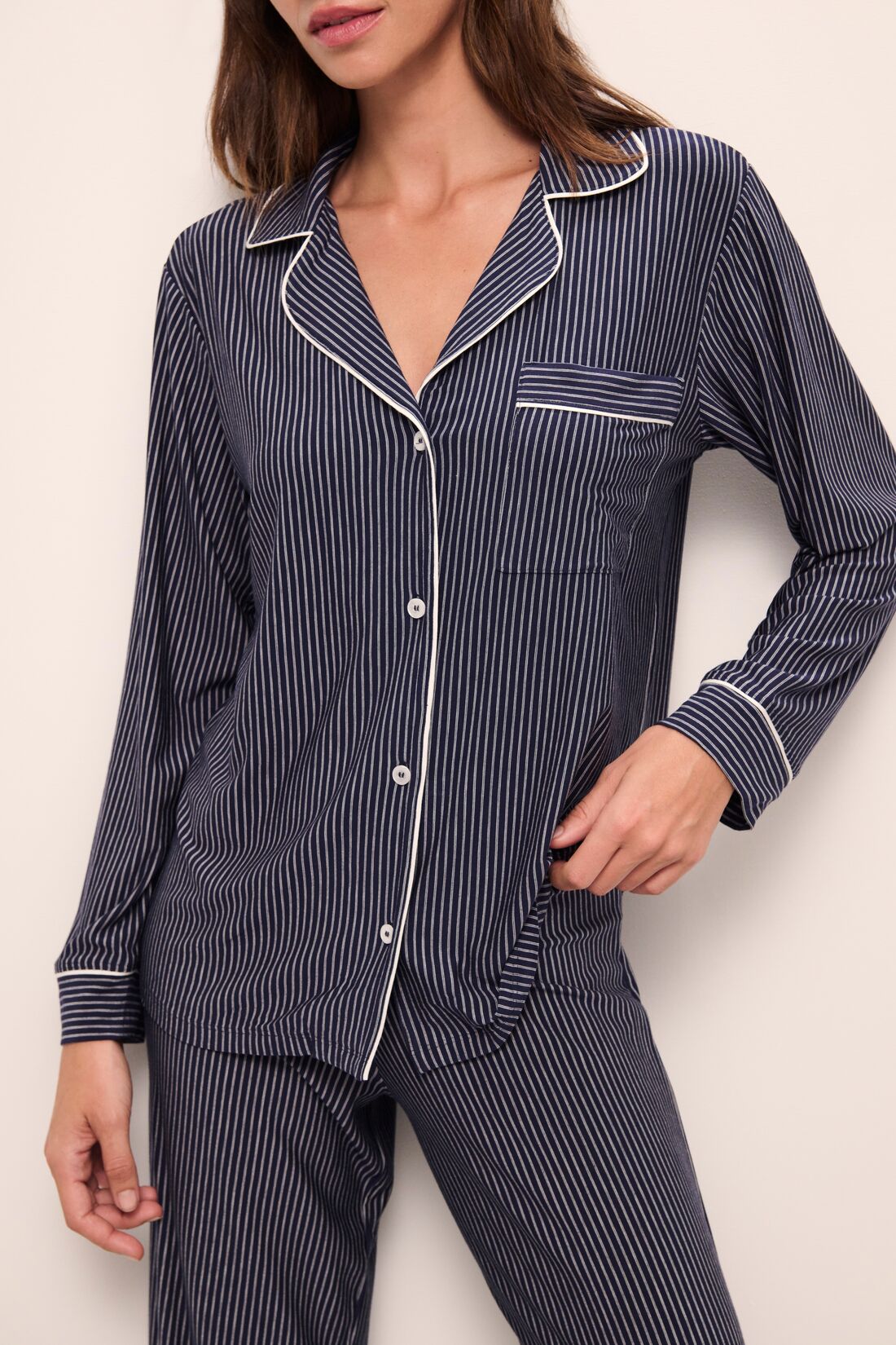 Model wears Gisele Printed TENCEL™ Modal Long PJ Set in Duo Stripe True Navy/Ivory.