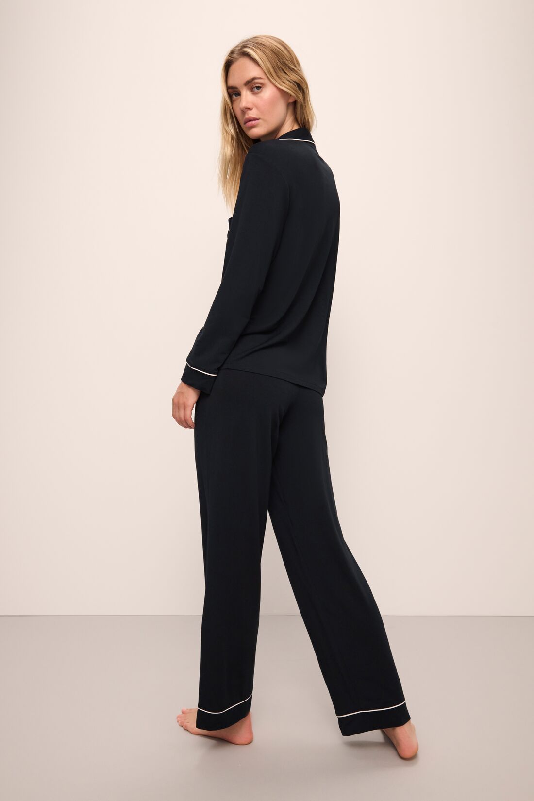 Model is Wearing the Gisele TENCEL™ Modal Long PJ Set in Black/Sorbet.