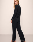 Model is Wearing the Gisele TENCEL™ Modal Long PJ Set in Black/Sorbet.