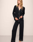 Model is Wearing the Gisele TENCEL™ Modal Long PJ Set in Black/Sorbet.