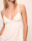 Model wears Mia TENCEL™ Modal Cami & Pant PJ Set in Ivory.