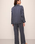 Model wears Inez Washable Silk Printed Long PJ Set in Classic Stripe Navy/Ivory.