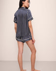 Model wears Inez Washable Silk Printed Short PJ Set in Classic Stripe Navy/Ivory.